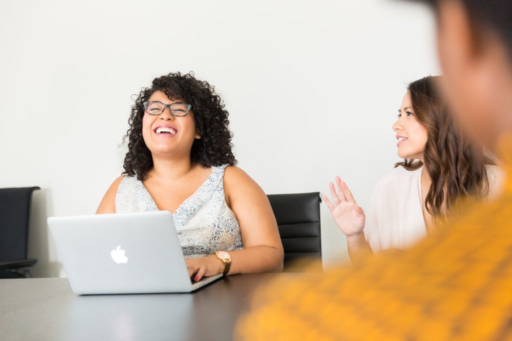 Picture of two female students laughing